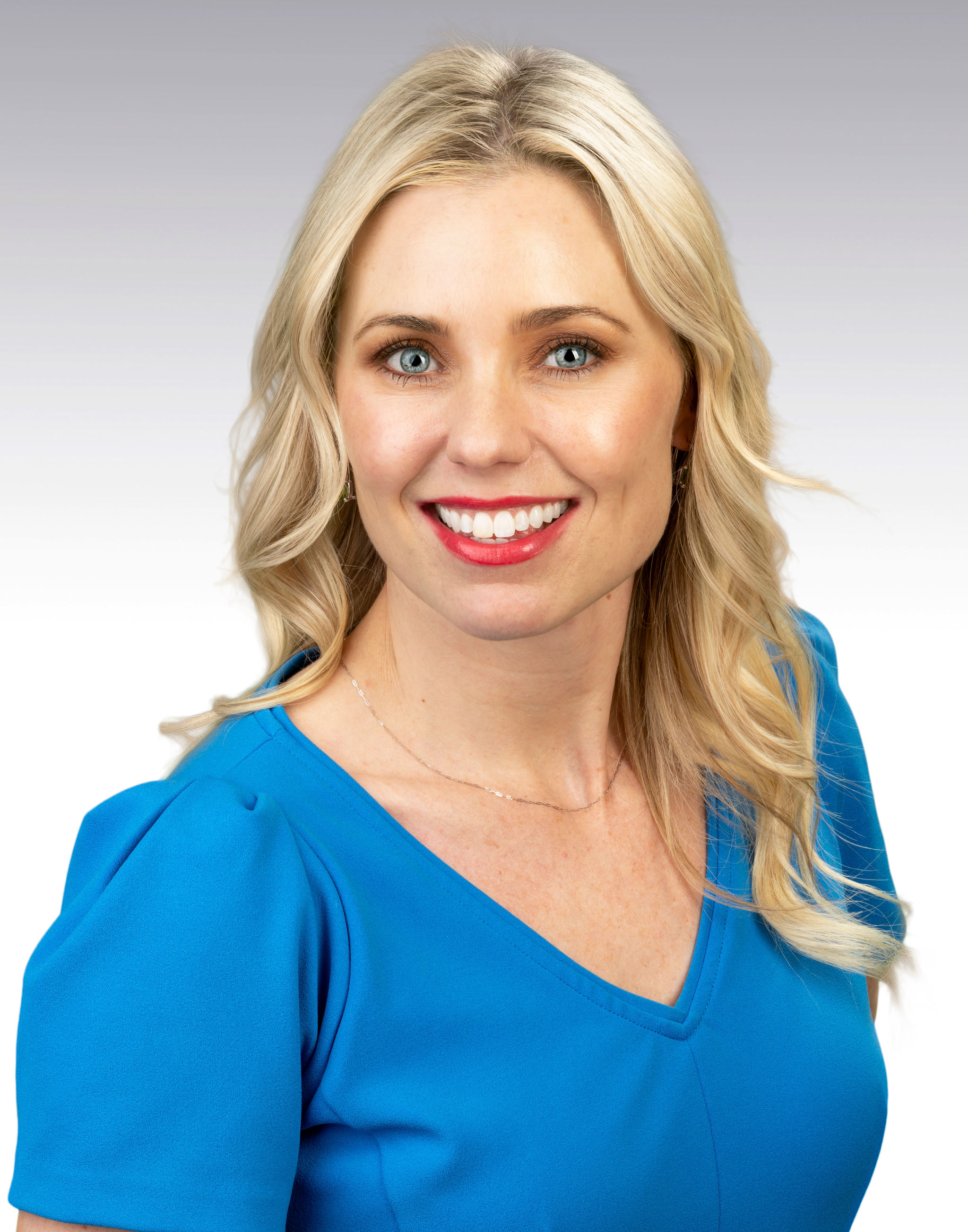 Professional headshot of Jenny Fugman.