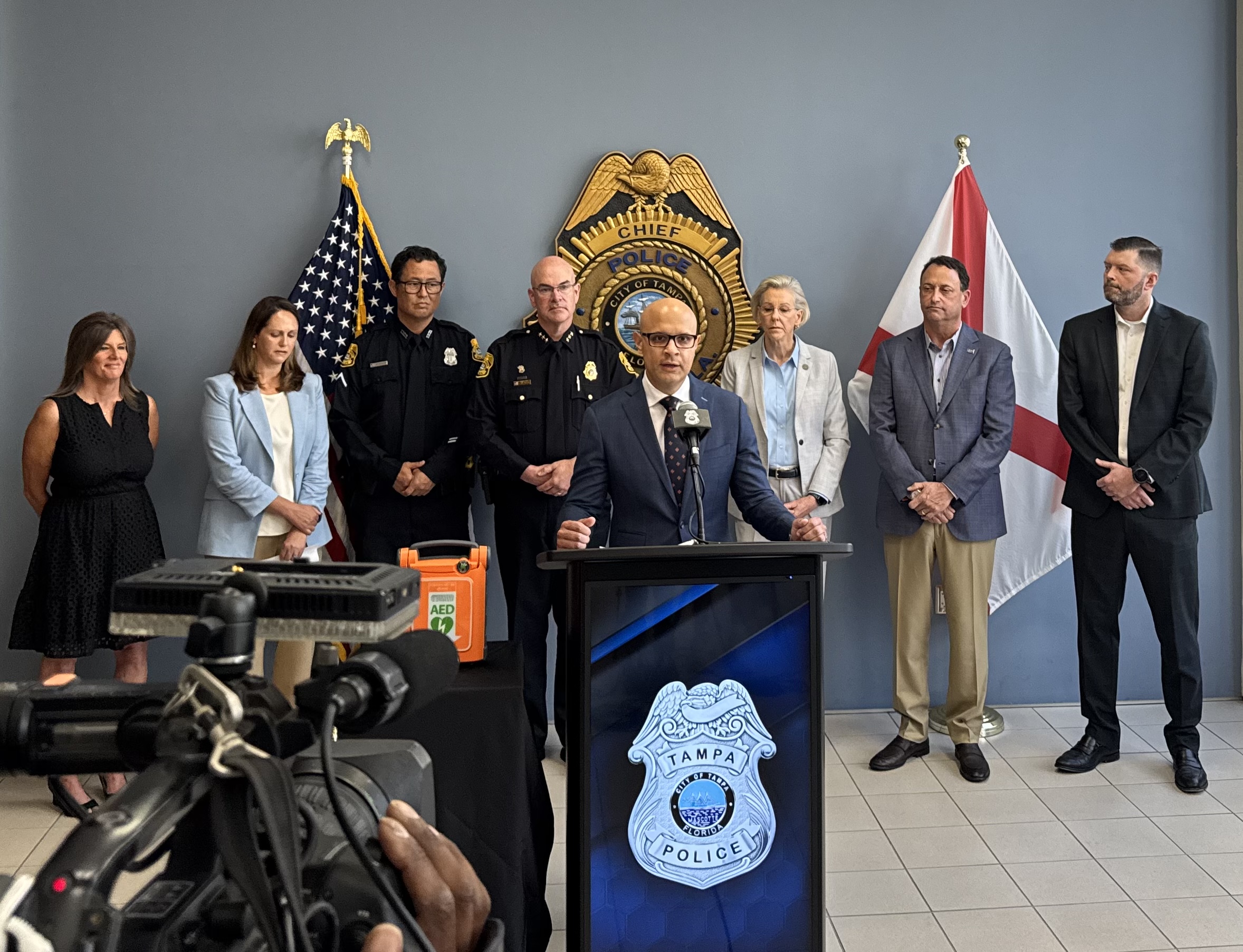 Jyric Sims at podium of Tampa Police AED presentation