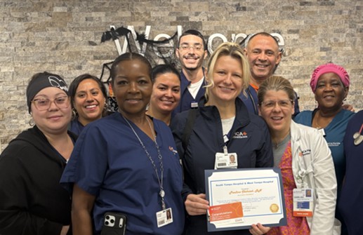 The team at South Tampa Hospital pose with their nursing Safety Champion certificate.