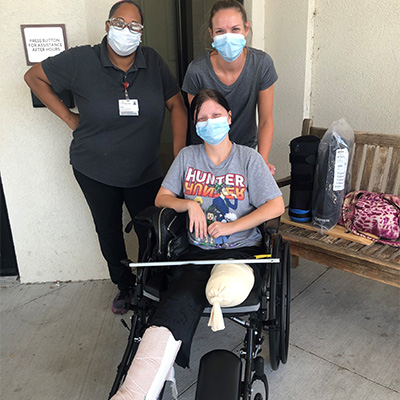 Patient Stephanie Spangler with hospital staff.