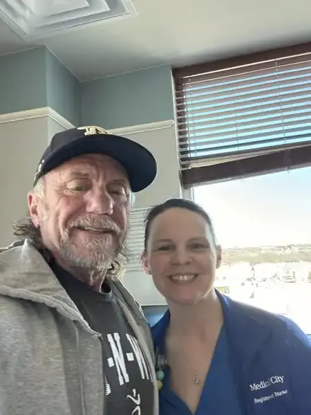 Brian Osborne taking selfie with ICU Nurse