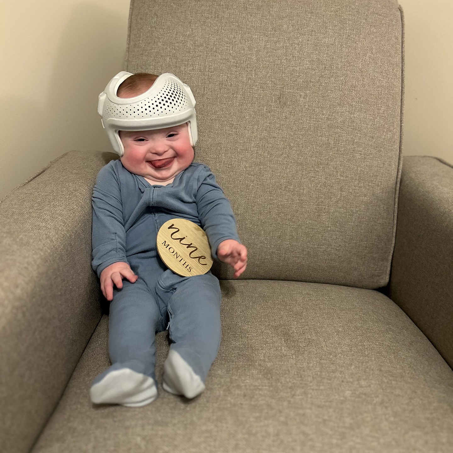 Bo smiling in safety helmet.