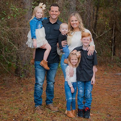 Ashley and Ben Thomas with family