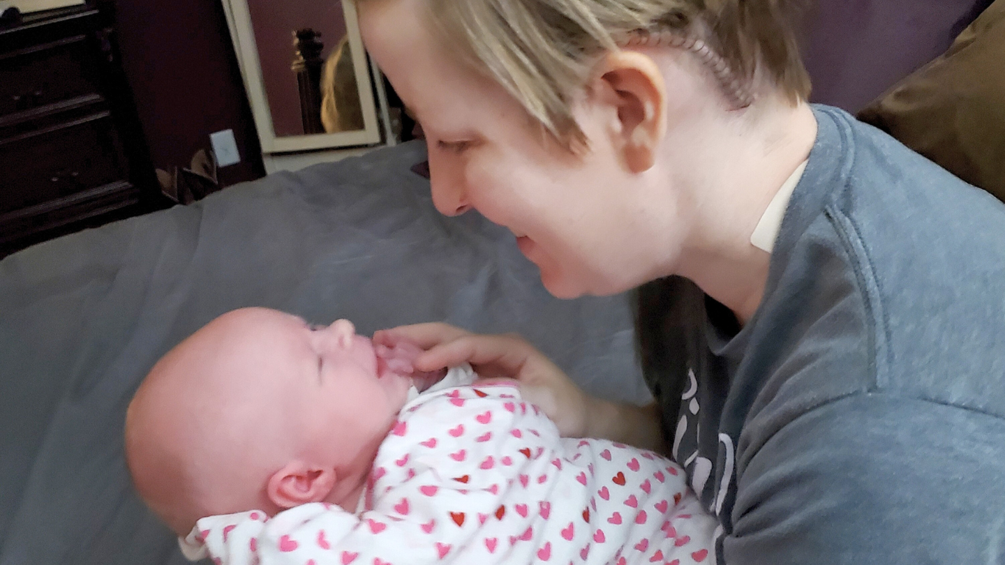 Michaela pictured with her baby