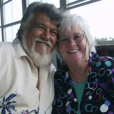 Gloria and her husband share a selfie.
