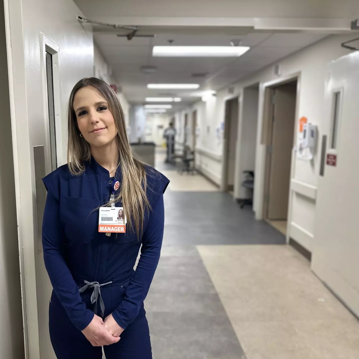 Elizabeth Blanco in scrubs at the hospital.