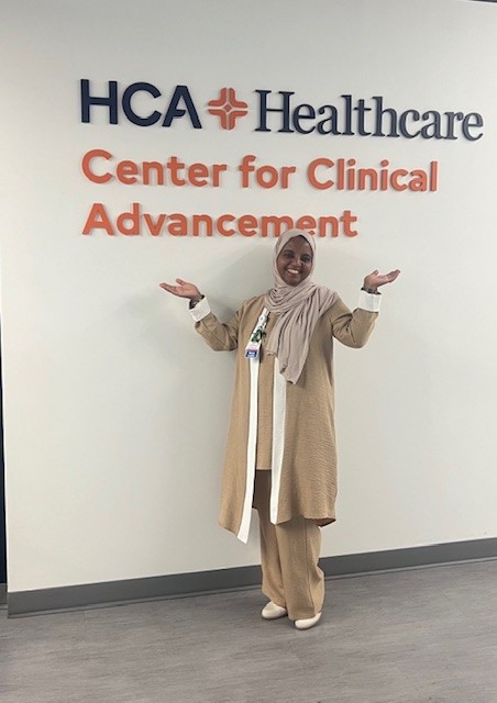 Photo of Fatma Nasser in front HCA Healthcare Center for Clinical Advancement.