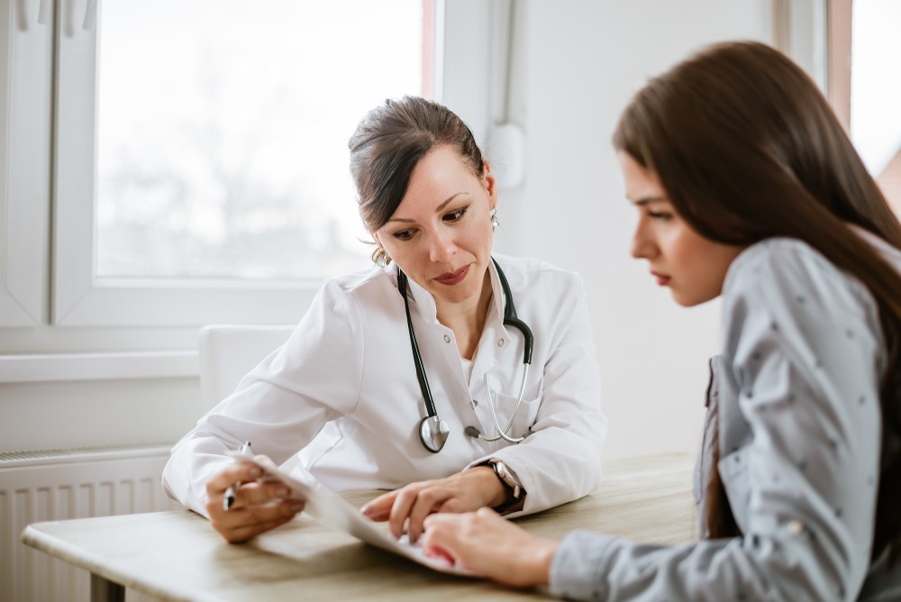 A doctor consulting with a patient.