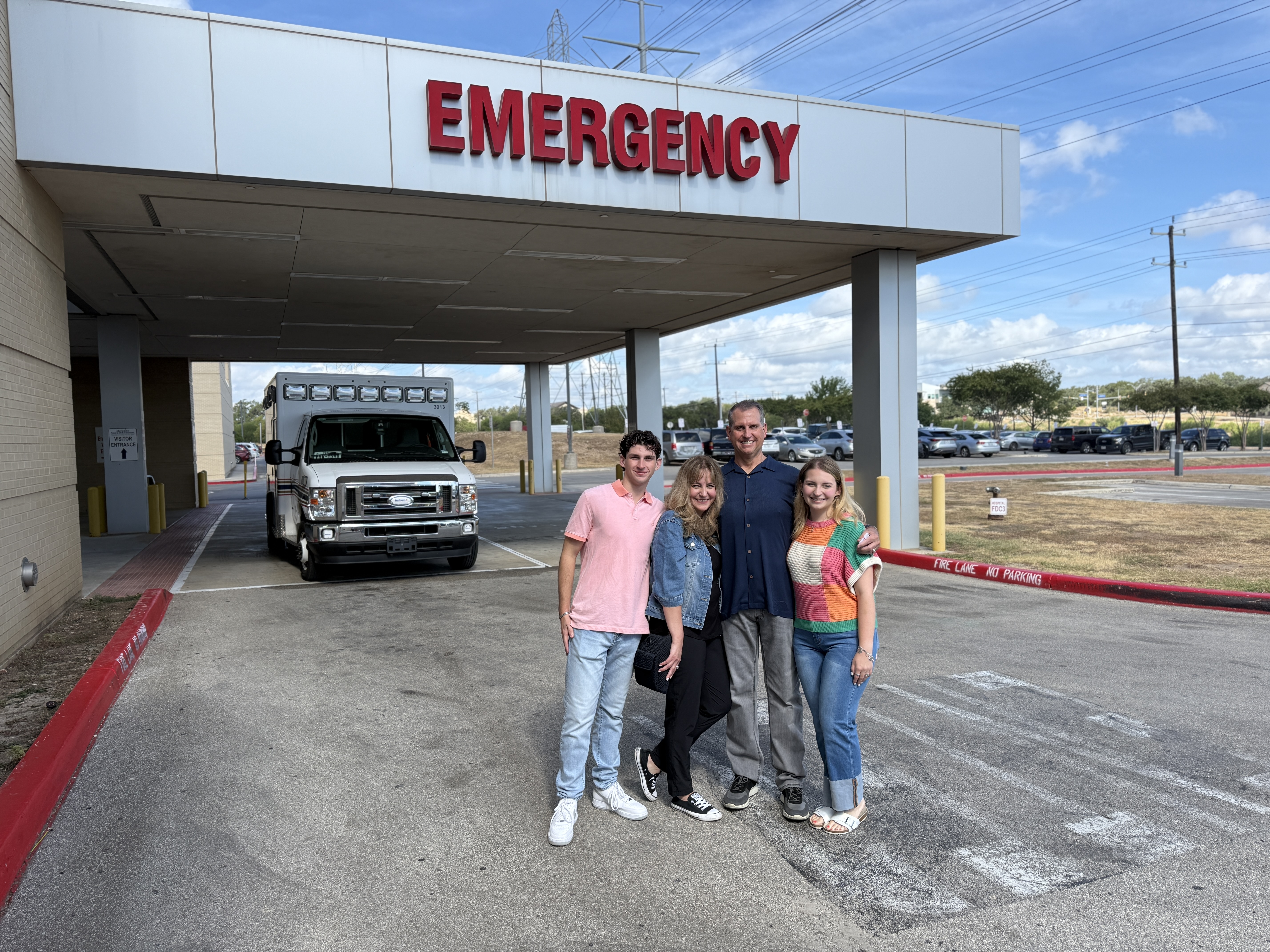 Troy Stephen and his family celebrate during a return visit to the emergency care entrance of Methodist Hospital | Stone Oak.