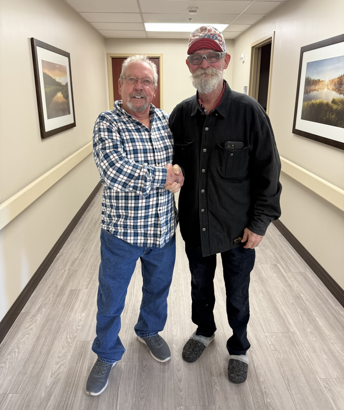 Randy and Billy shaking hands