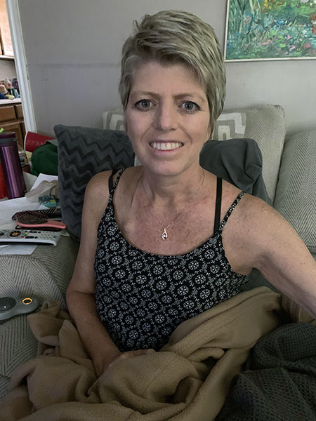 Sandy Crawford smiling, on the road to recovery.