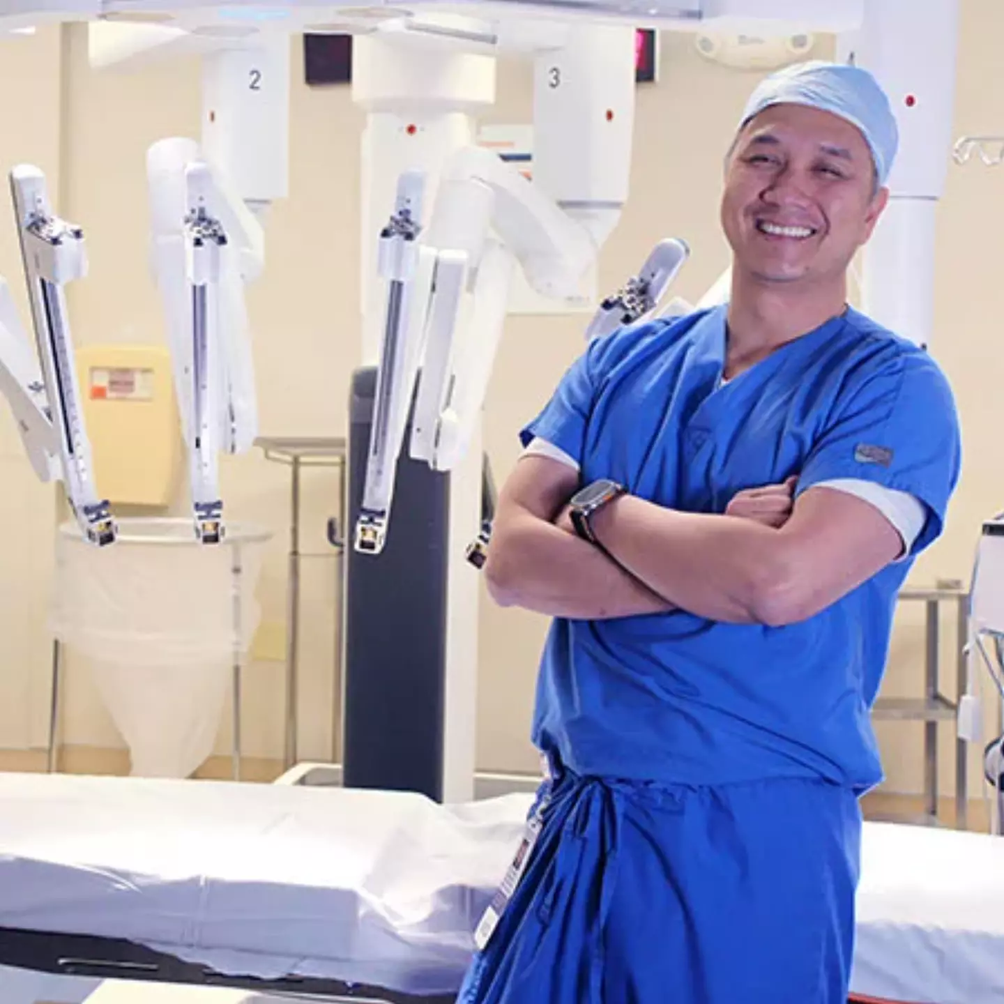 Dr. Bao-Thuy Hoang, MD with robotic surgery equipment.
