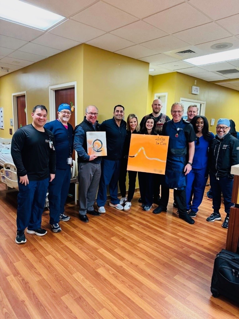 colleagues on the cardiovascular team pose for picture