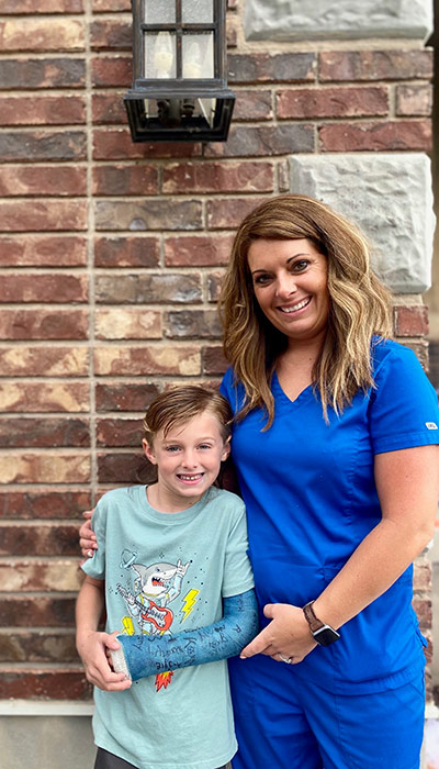 CT Tech Shaina with her son.