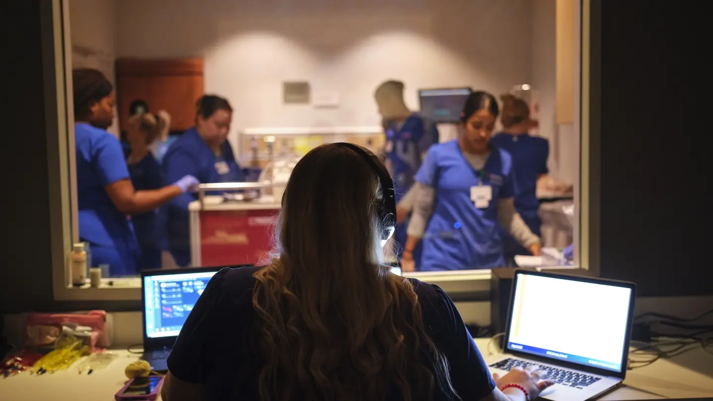 Multiple nurses engaging in an educational exercise