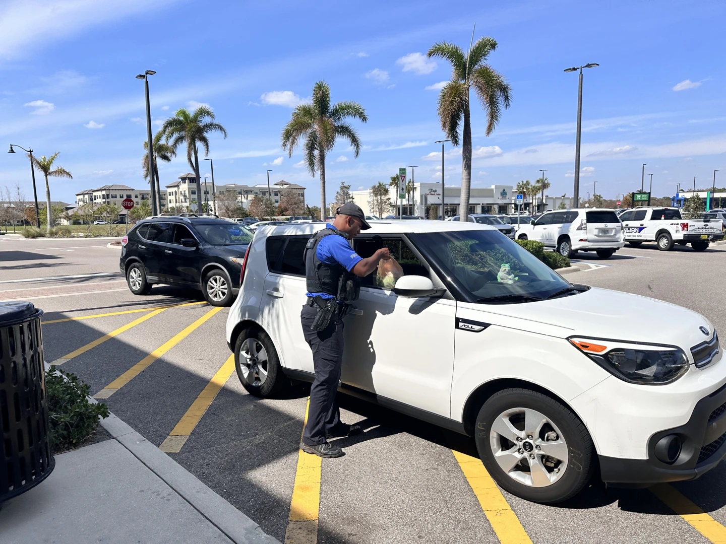 North Port Police Corporal John Contorno collected unwanted prescription drugs from residents at a convenient drive-through at the event.