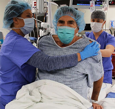 Just before surgery, Chip Richie speaks to the public relations team filming his story.