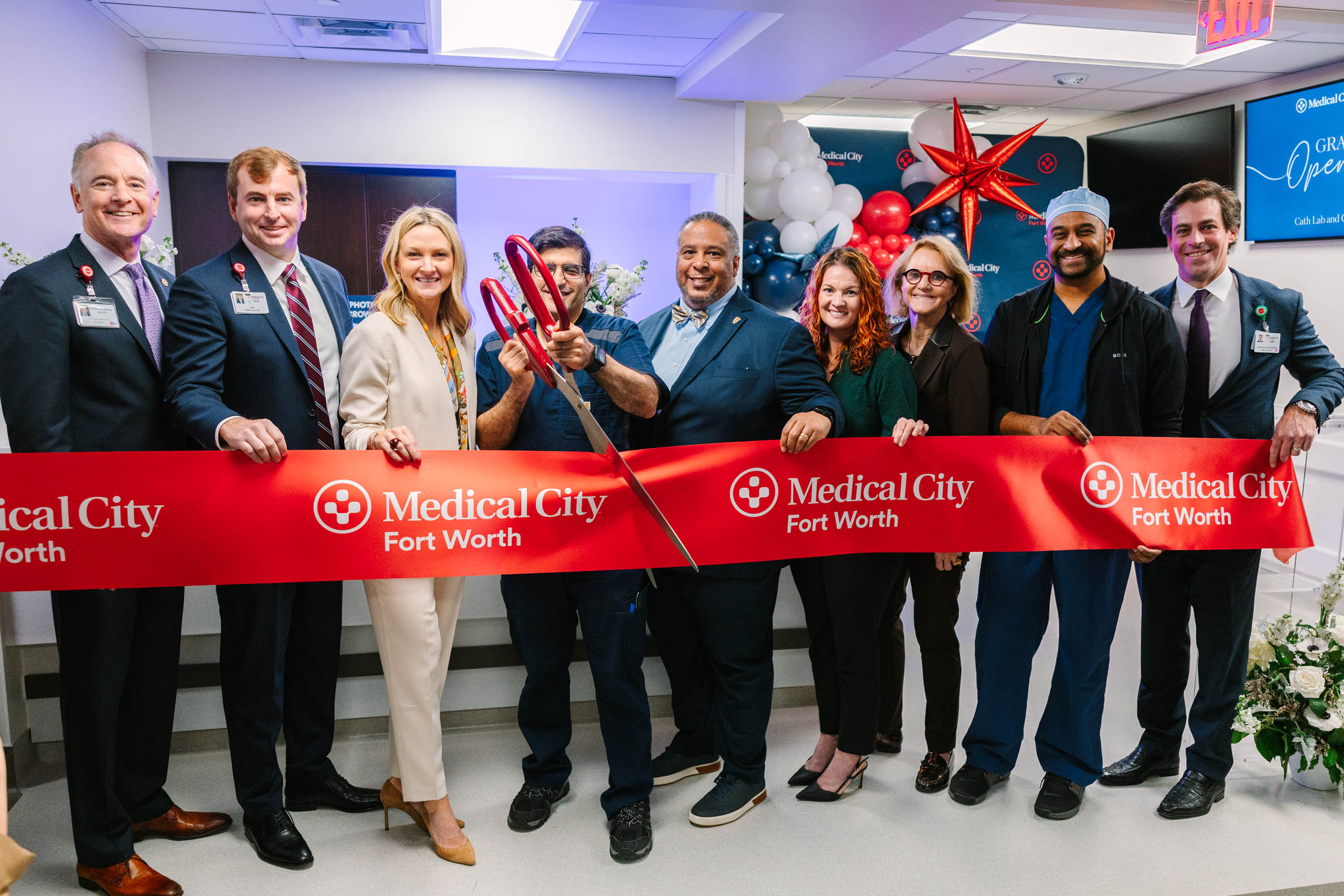 Leaders gather at the ribbon cutting ceremony for the Cath lab and OR expansion at Medical City Fort Worth.