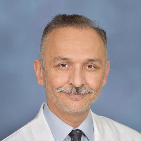 A headshot of Dr. Nauman Jahangir, a heart and vascular surgeon.
