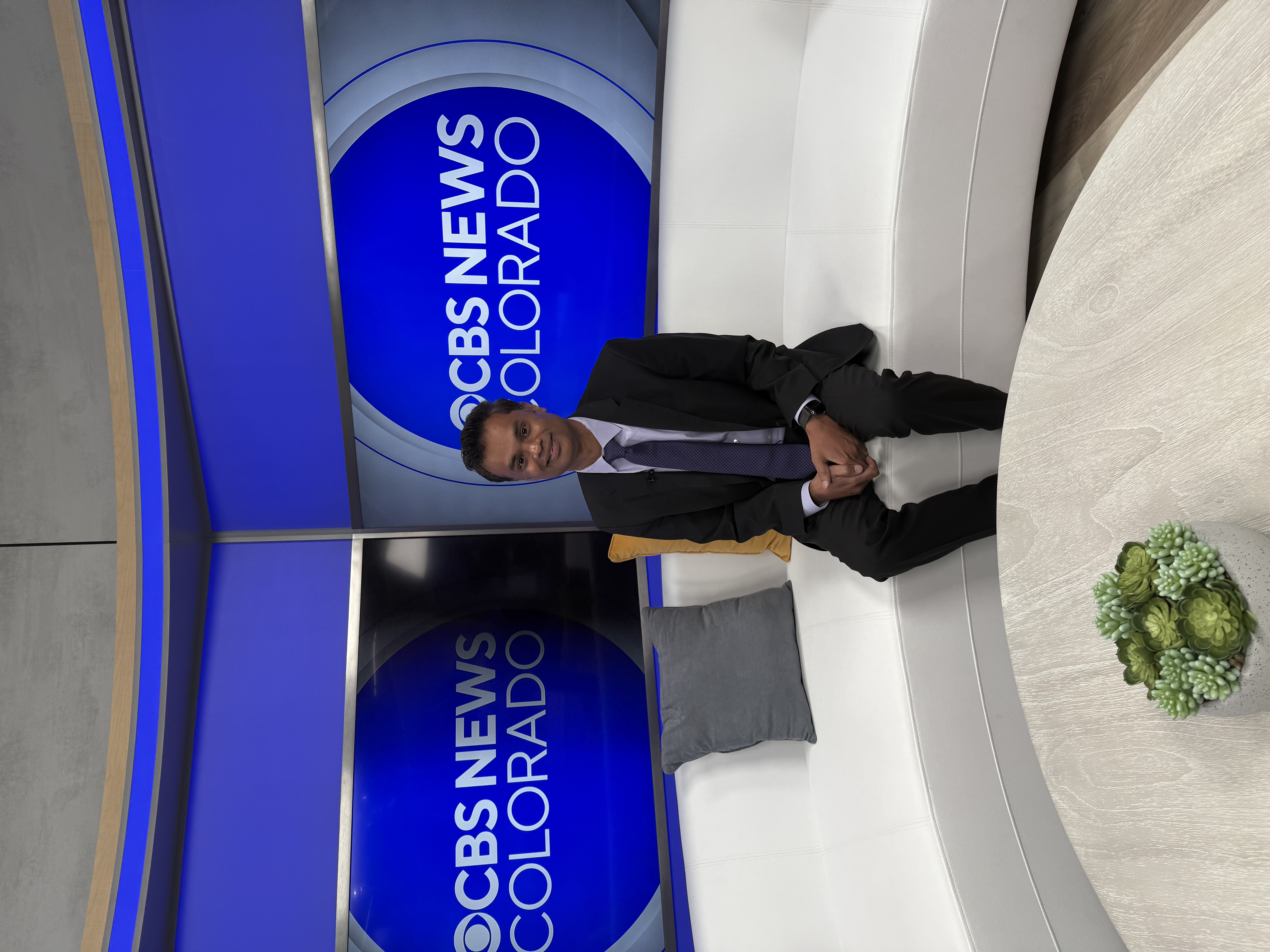 Dr. Manoj Bupathi on the set of CBS News Colorado