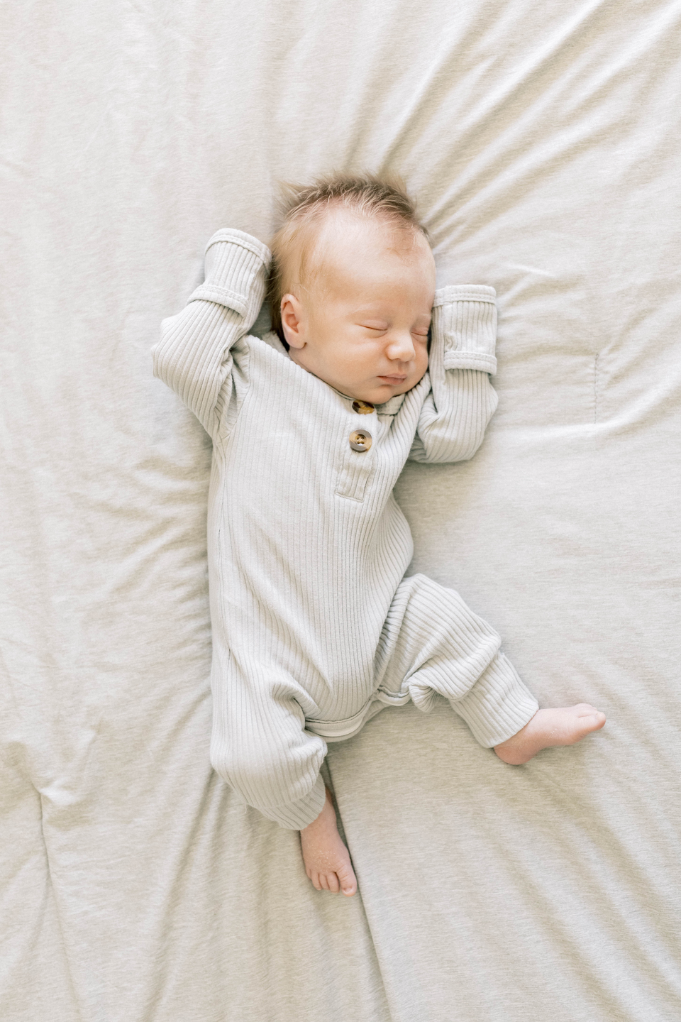 Baby Corbin sleeps soundly in his bed.