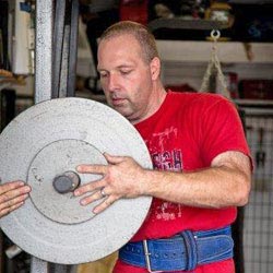 Blake Brownlee holding a weight.