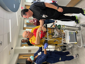 After surgery, Robert walked daily with his physical therapists to aid in his recovery and regain strength. On this day, he stopped to thank one of his nurses for the extraordinary care he received.