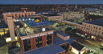 Exterior night time view of the Rapides Regional Medical Center building.