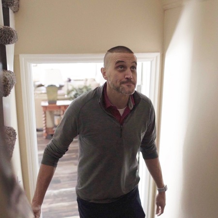 Nathan Barton walking up stairs.