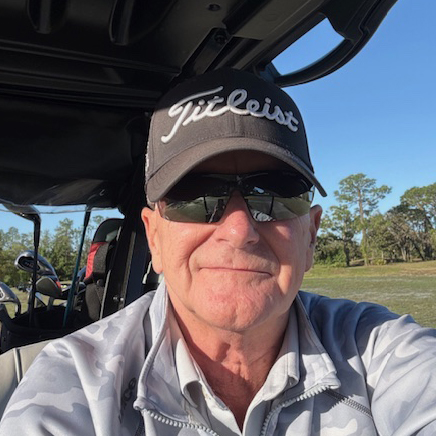 Jackson Cairns older man selfie in golf cart