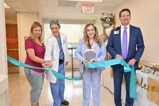 The Methodist Hospital team clipping the ribbon 