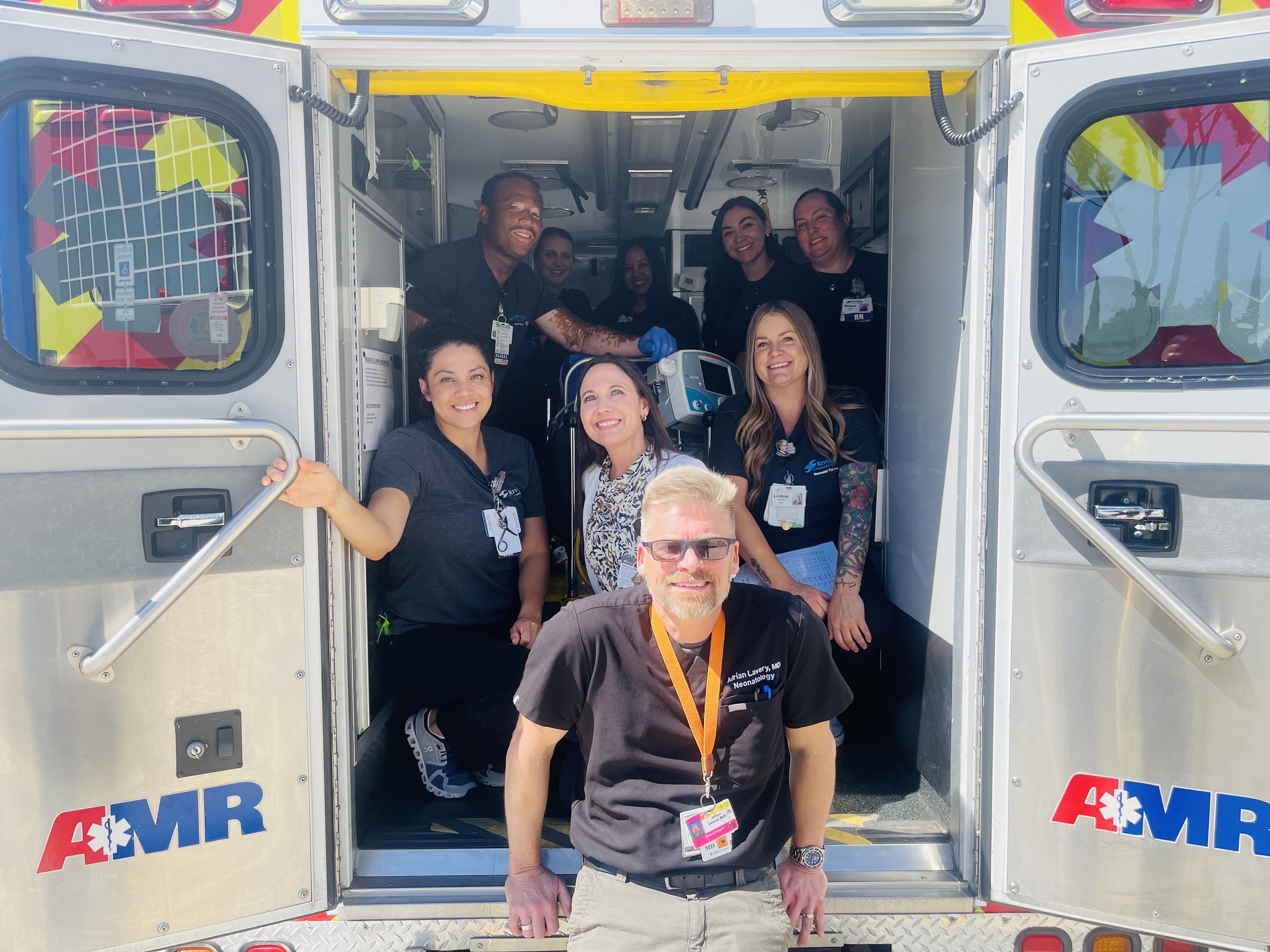 Some of the RCH NICU Transport members pose for a photo in the ambulance