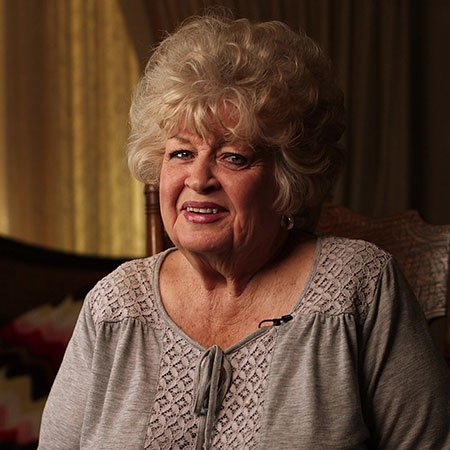 Carol Oxborrow, smiling.