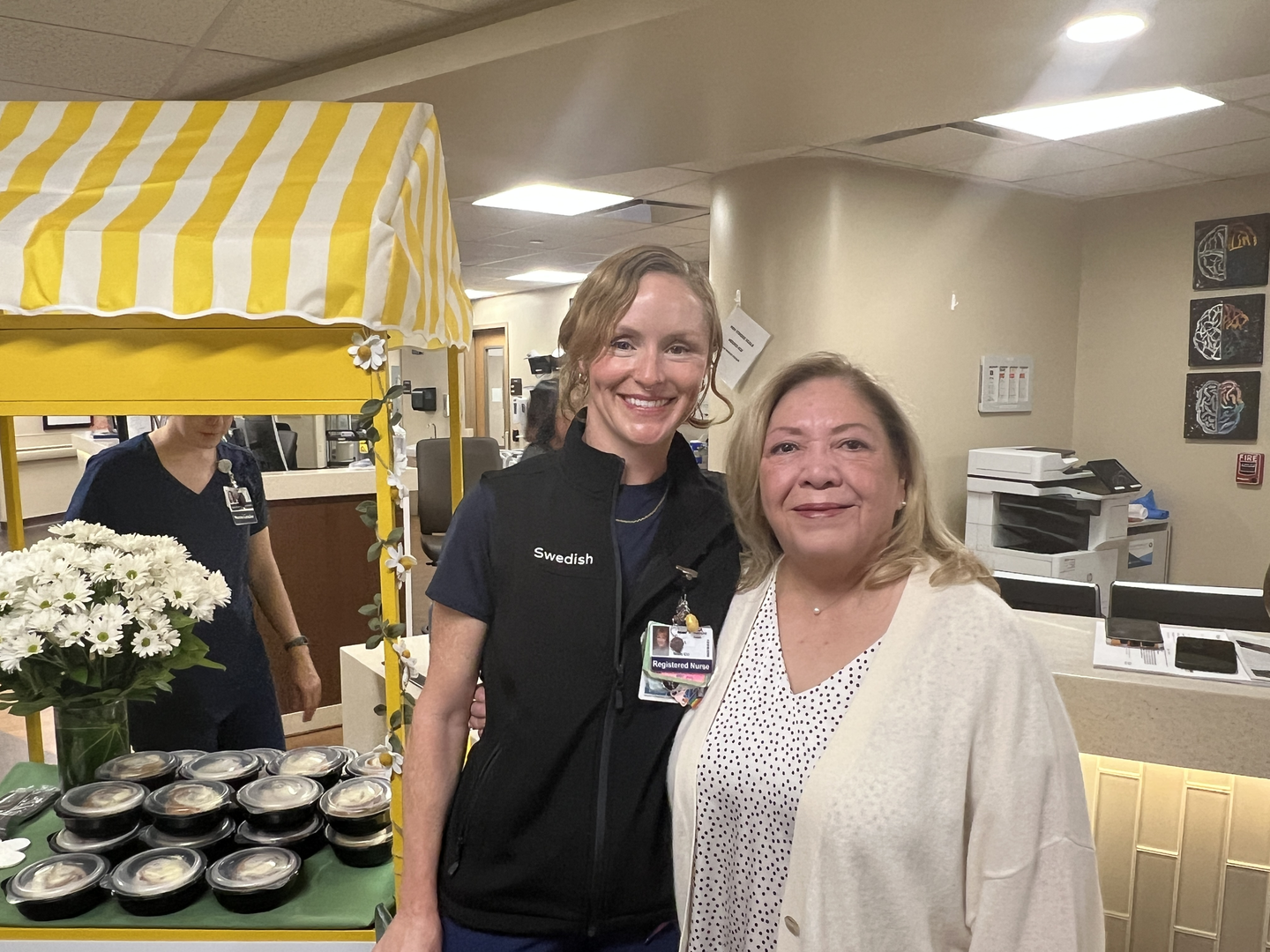 Julia Yocum standing next to another woman for the photo.