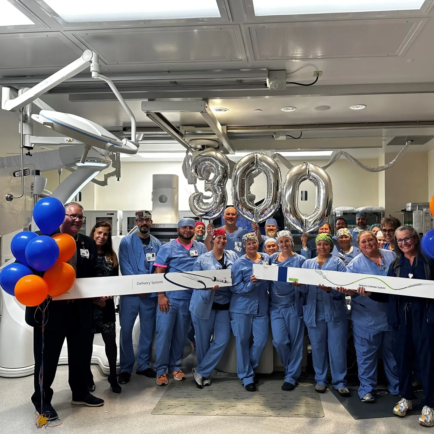 Surgery team in operating room group photo.