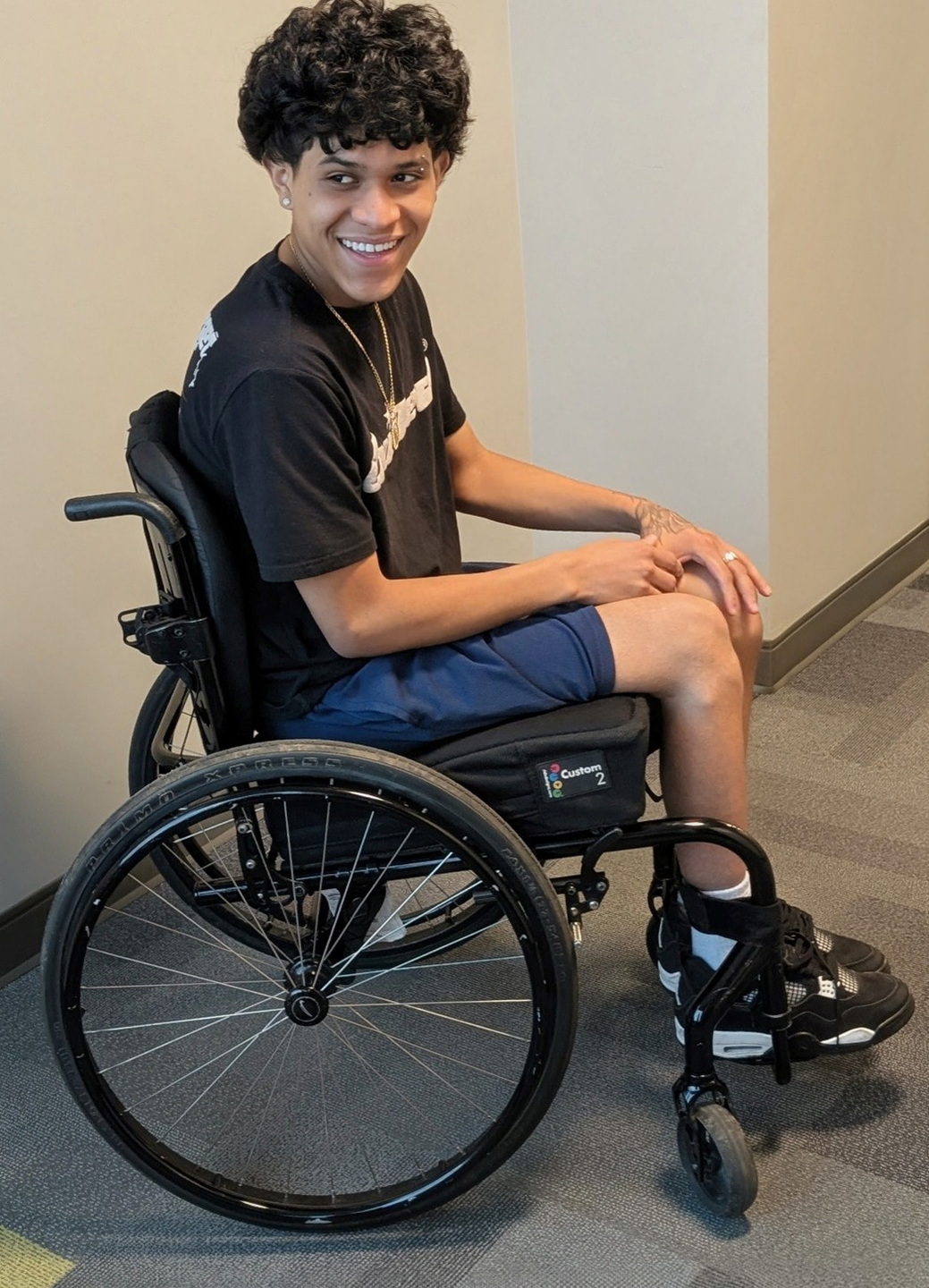 Kevin in his new wheelchair