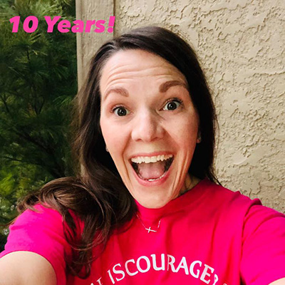 Alicia Steinheider smiling, with image text '10 Years!' above her head.