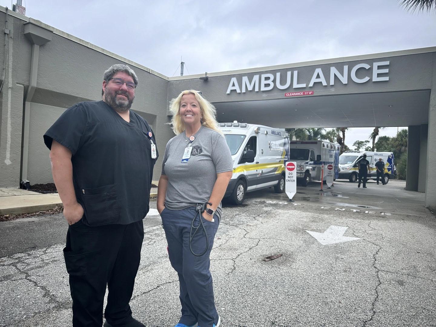 Englewood staff standing in front of Englewood Hospital.