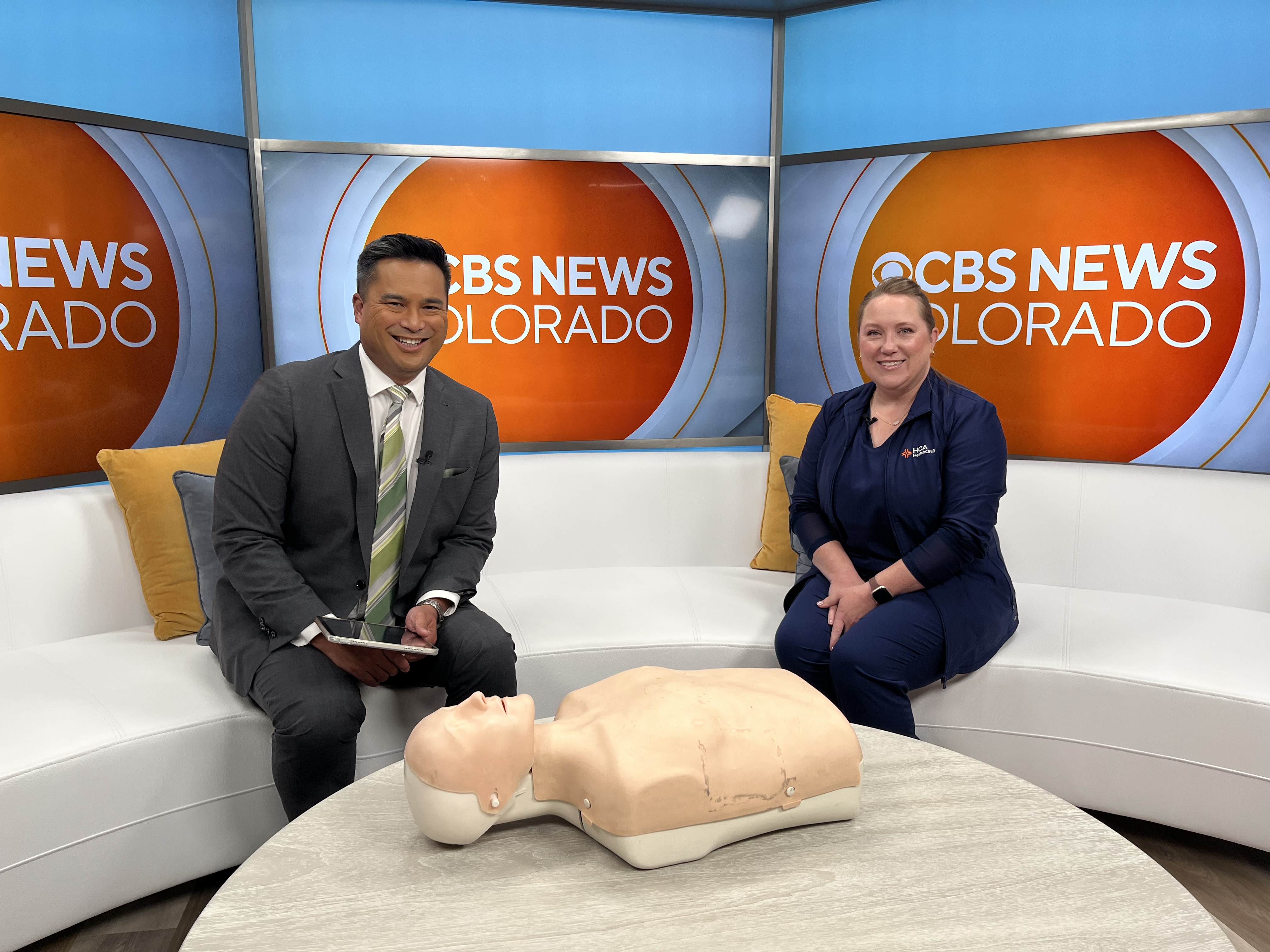Kerri Renke, RN, Trauma Program Director for Mountain Ridge explains how to properly perform CPR to CBS News Colorado host.