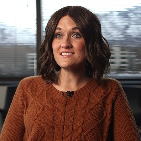 Sandi Mason smiling.