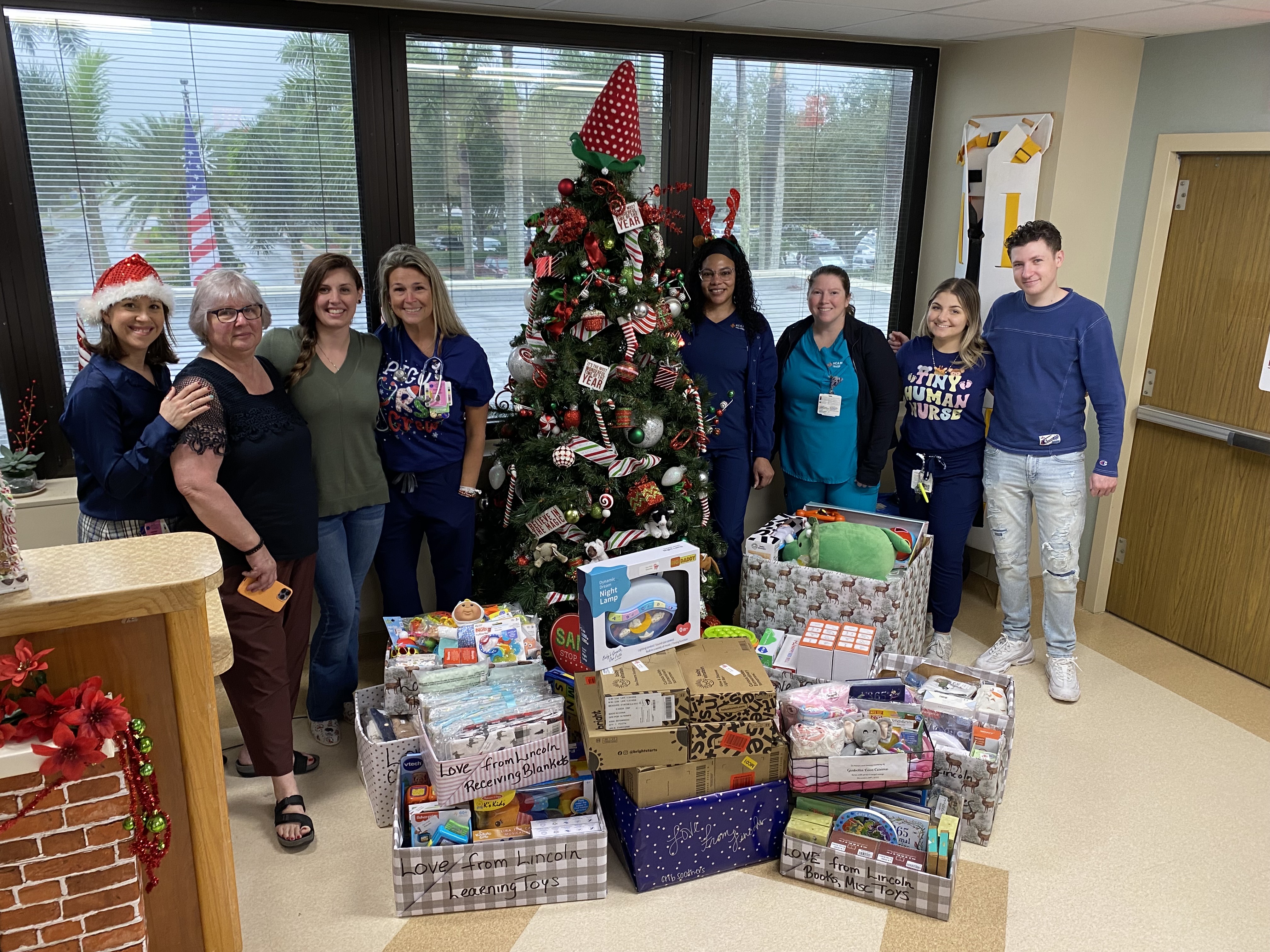 Pediatric team with Haley Davidson and family