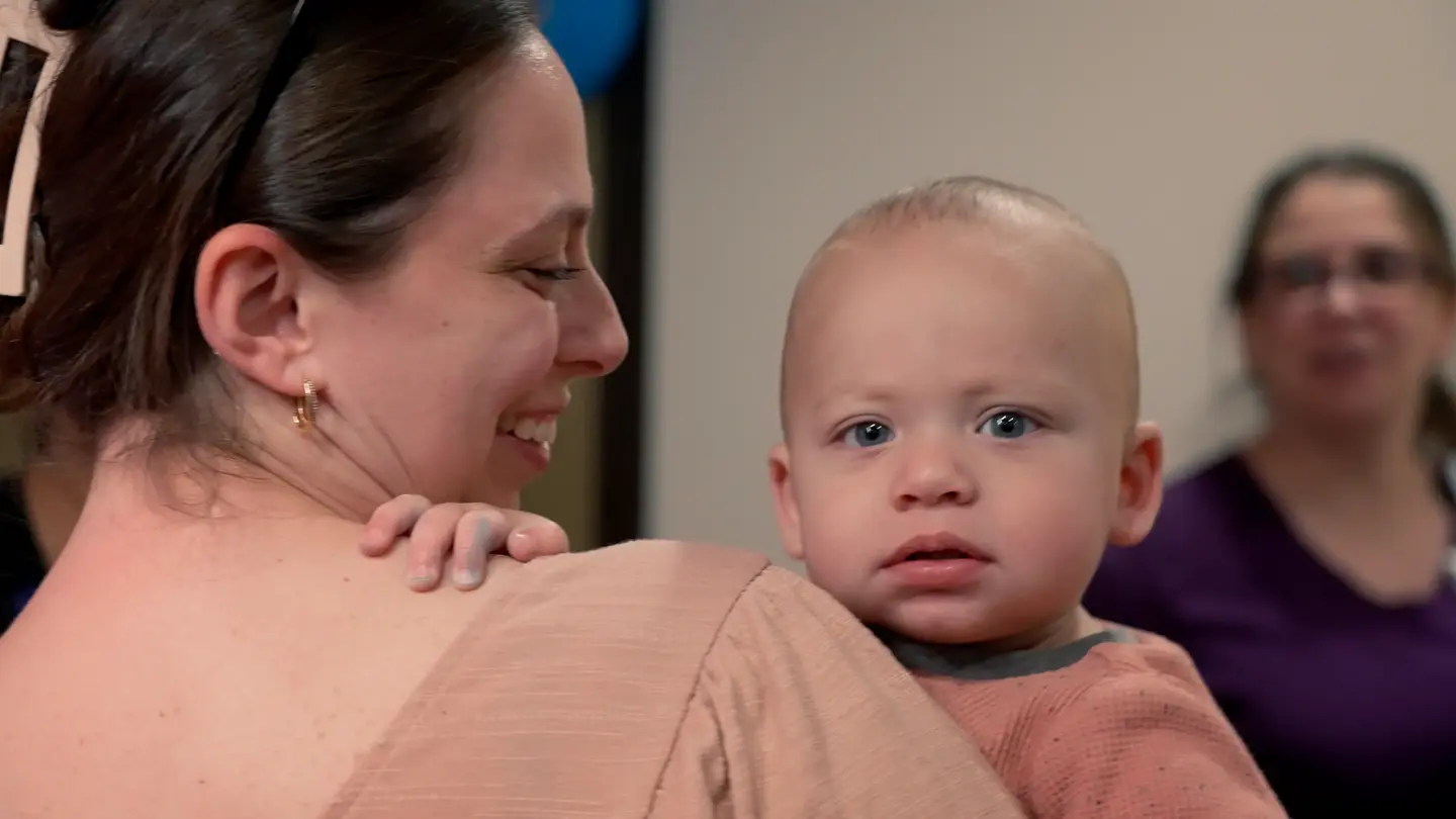 Female holding a toddler
