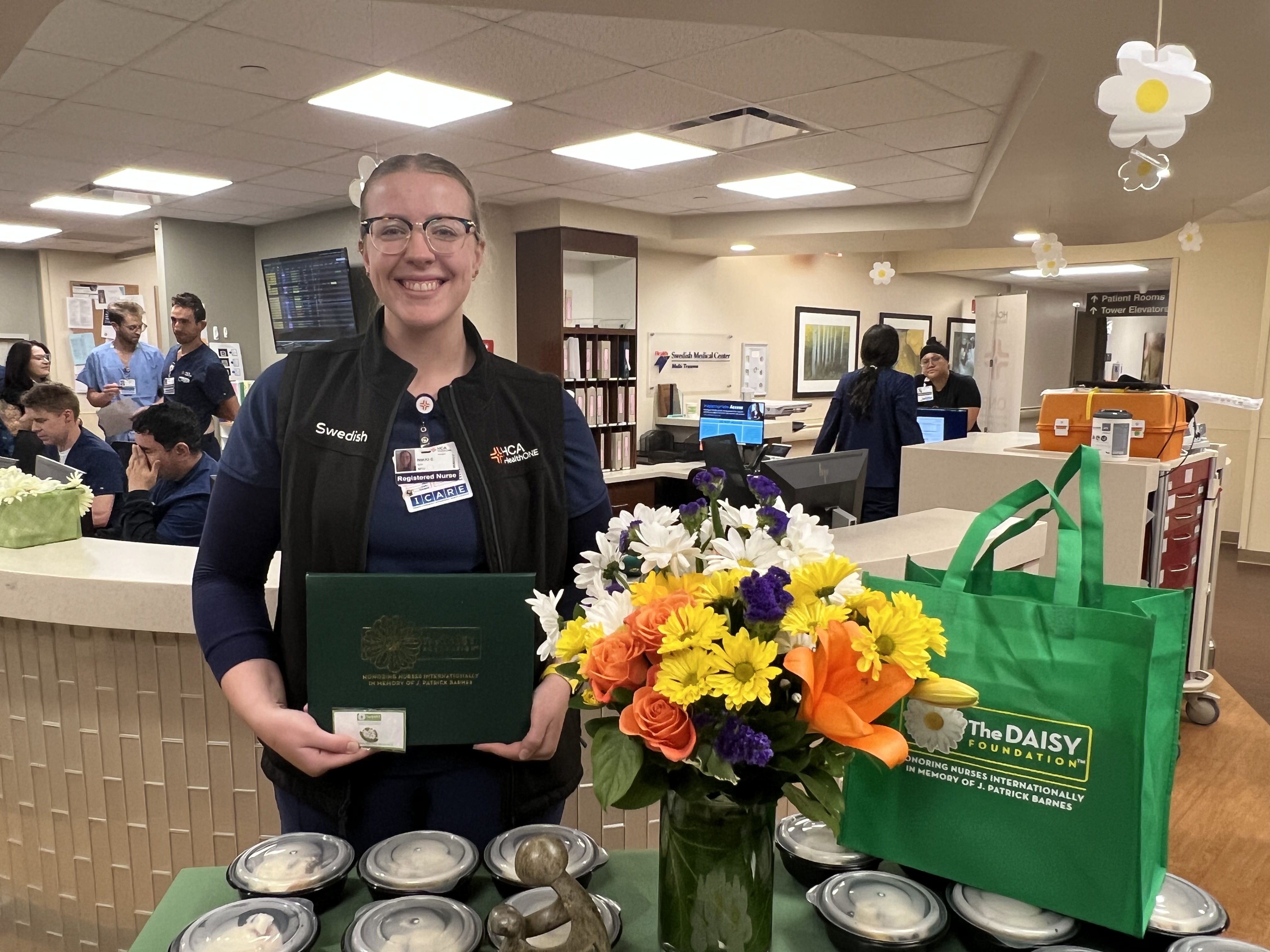 Nikki Erdman the latest DAISY Award winner for HCA HealthONE.