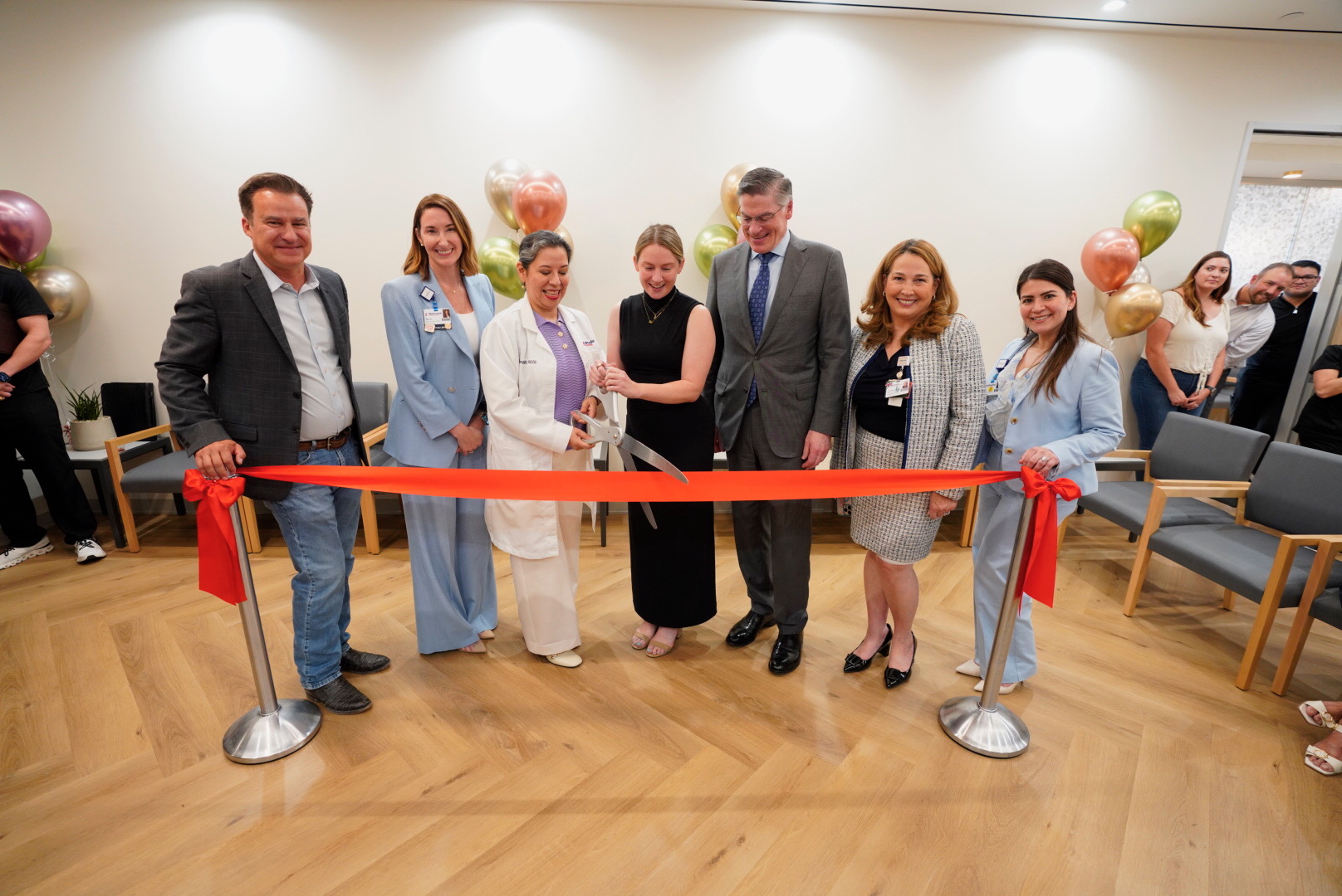 Ribbon cutting - hospital and community leaders gathered for a ribbon cutting ceremony