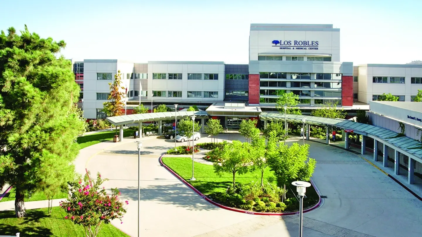Exterior main entrance of Los Robles Regional Medical Center on a sunny day.
