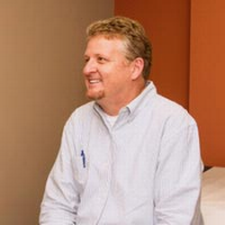 Patrick Hamilton smiling.