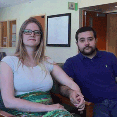 Jose and Sarah Sala-Guth holding hands.