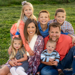 Jackie L. and her family pose for a picture.