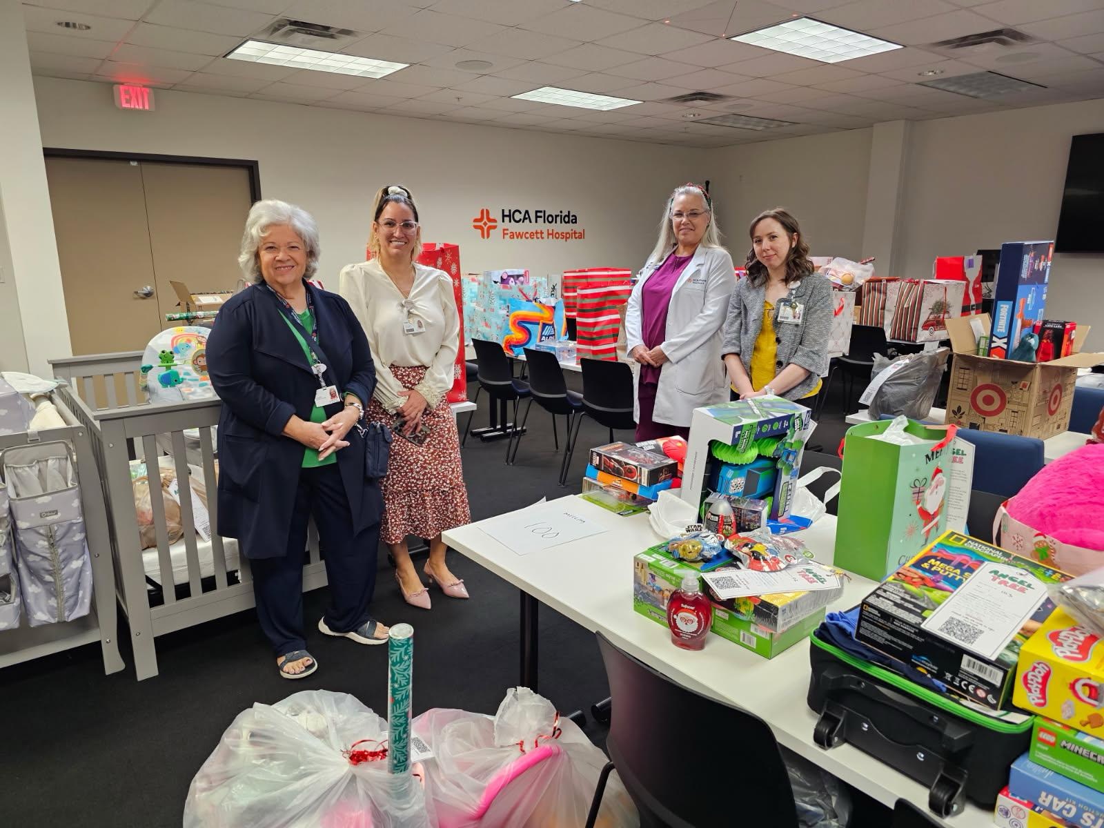 HCA Fawcett Hospital colleagues with Angel Tree gifts.