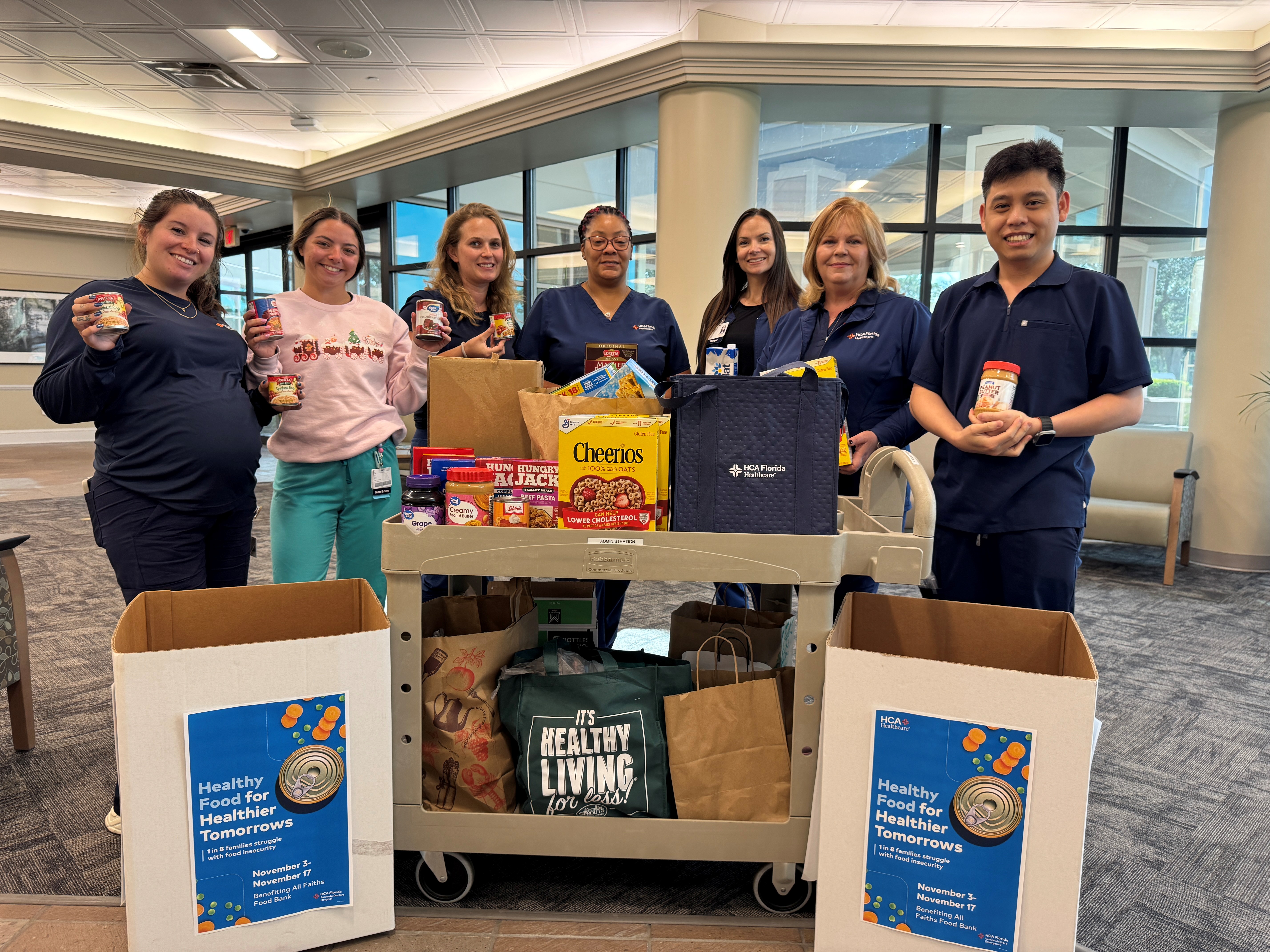HCA Florida Sarasota Doctors Hospital collect food items during the recent food drive.